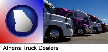 row of semi trucks at a truck dealership in Athens, GA