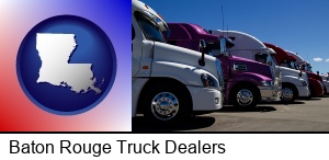 Baton Rouge, Louisiana - row of semi trucks at a truck dealership