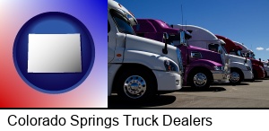 Colorado Springs, Colorado - row of semi trucks at a truck dealership