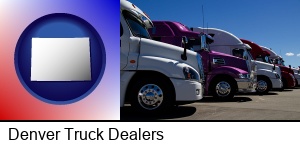 Denver, Colorado - row of semi trucks at a truck dealership