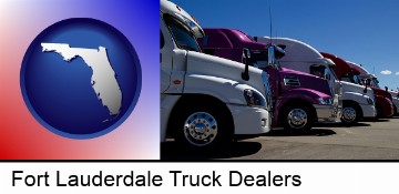 row of semi trucks at a truck dealership in Fort Lauderdale, FL