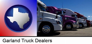 row of semi trucks at a truck dealership in Garland, TX