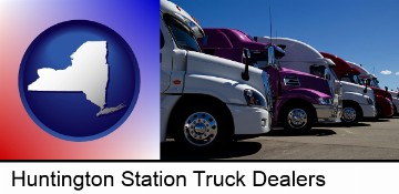 row of semi trucks at a truck dealership in Huntington Station, NY
