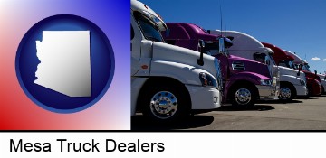 row of semi trucks at a truck dealership in Mesa, AZ