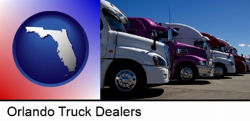 row of semi trucks at a truck dealership in Orlando, FL