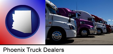 row of semi trucks at a truck dealership in Phoenix, AZ