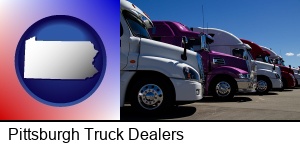 Pittsburgh, Pennsylvania - row of semi trucks at a truck dealership