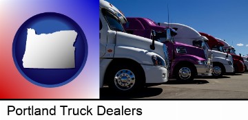 row of semi trucks at a truck dealership in Portland, OR