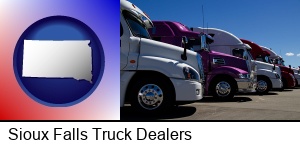Sioux Falls, South Dakota - row of semi trucks at a truck dealership