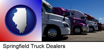 row of semi trucks at a truck dealership in Springfield, IL