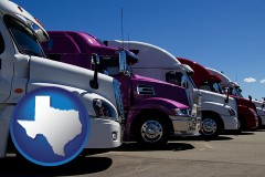 texas map icon and row of semi trucks at a truck dealership