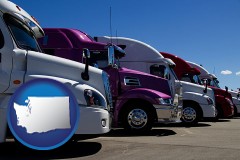 washington map icon and row of semi trucks at a truck dealership