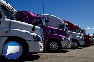 row of semi trucks at a truck dealership - with Connecticut icon