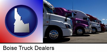 row of semi trucks at a truck dealership in Boise, ID