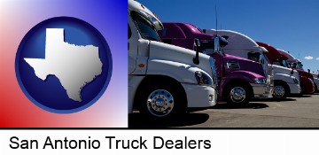 row of semi trucks at a truck dealership in San Antonio, TX