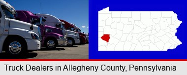 row of semi trucks at a truck dealership; Allegheny County highlighted in red on a map
