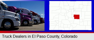 row of semi trucks at a truck dealership; Elbert County highlighted in red on a map