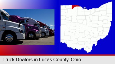 row of semi trucks at a truck dealership; Lucas County highlighted in red on a map