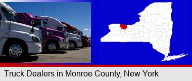 row of semi trucks at a truck dealership; Monroe County highlighted in red on a map