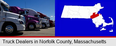 row of semi trucks at a truck dealership; Norfolk County highlighted in red on a map