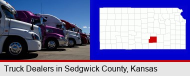 row of semi trucks at a truck dealership; Sedgwick County highlighted in red on a map