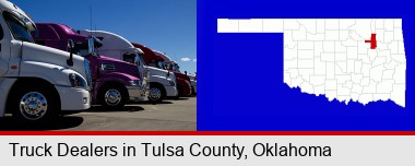 row of semi trucks at a truck dealership; Tulsa County highlighted in red on a map